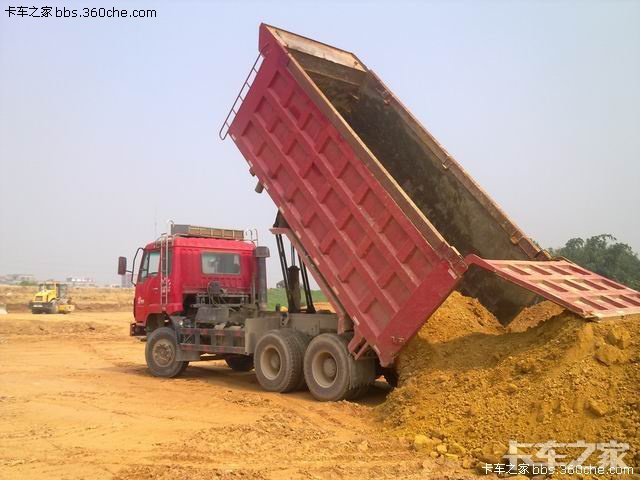 带上车标去  拉土 >