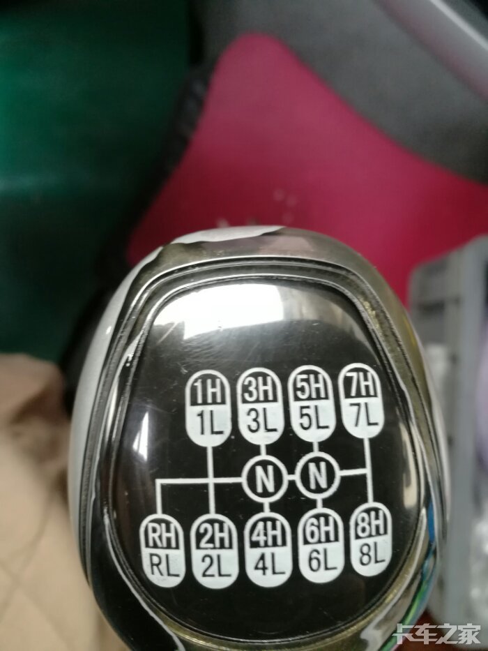 豪沃t7h440档杆高低速拨片怎样操作?